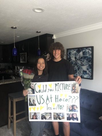 Sophomore Ashton Rulewicz shows his successful homecoming proposal to sophomore Maya Bautista.