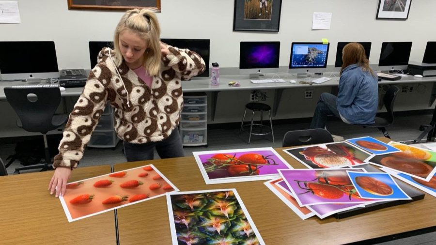 Alyssa Studebaker reviewing her portfolio