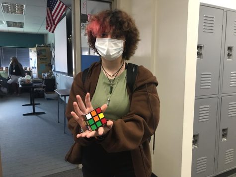 Sophmore Tatyana Lowe shows off a Rubix Cube, a popular fidget toy