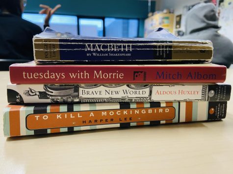 A stack of books that the sophomore honors class reads each year.