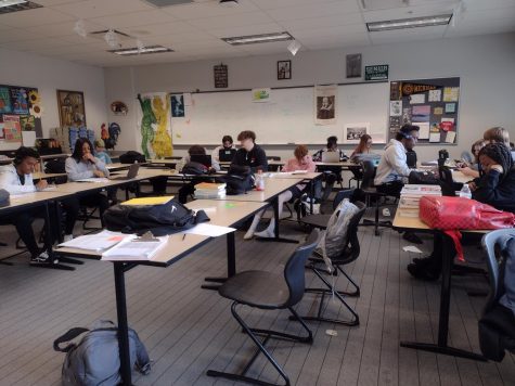 Sophomores in Courtney Breons class work on an end of the year assignment.  During sophomore year students usually pick a path they will follow for the next two years.