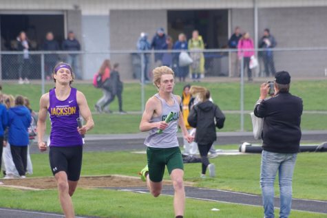 In this picture junior Braedon Paolini is passing a Jackson runned in the 4x800