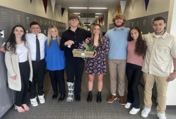 Students from the group company Plant Haven pose with their product.  Students involved in Plant Haven are Emma Pooley, Roman Woods, Marcus Alvarado, Bryce Moore, Makenna Boord, Marli Dye, Nora Salem, and Austin Morrison. 