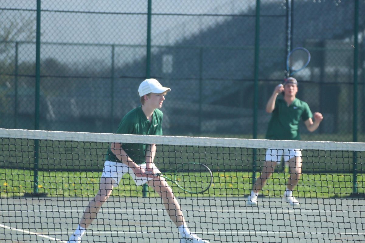 Boys tennis team at a spring match