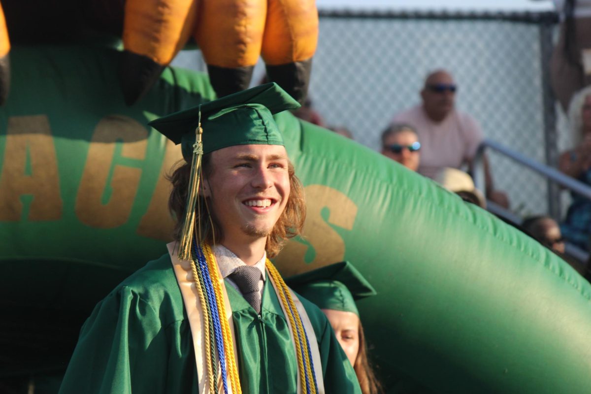 Senior Ian Kimbrough steps onto the field for the first time in the ceremony. 