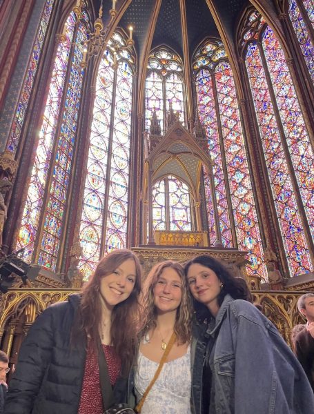 Willow Carcione, Madison Woofter and Greta Burchfield huddle inside the gothic-style chapel known as Sainte-Chapelle. "Being in France with all my friends made the experience very enjoyable," senior Greta Burchfield said. 