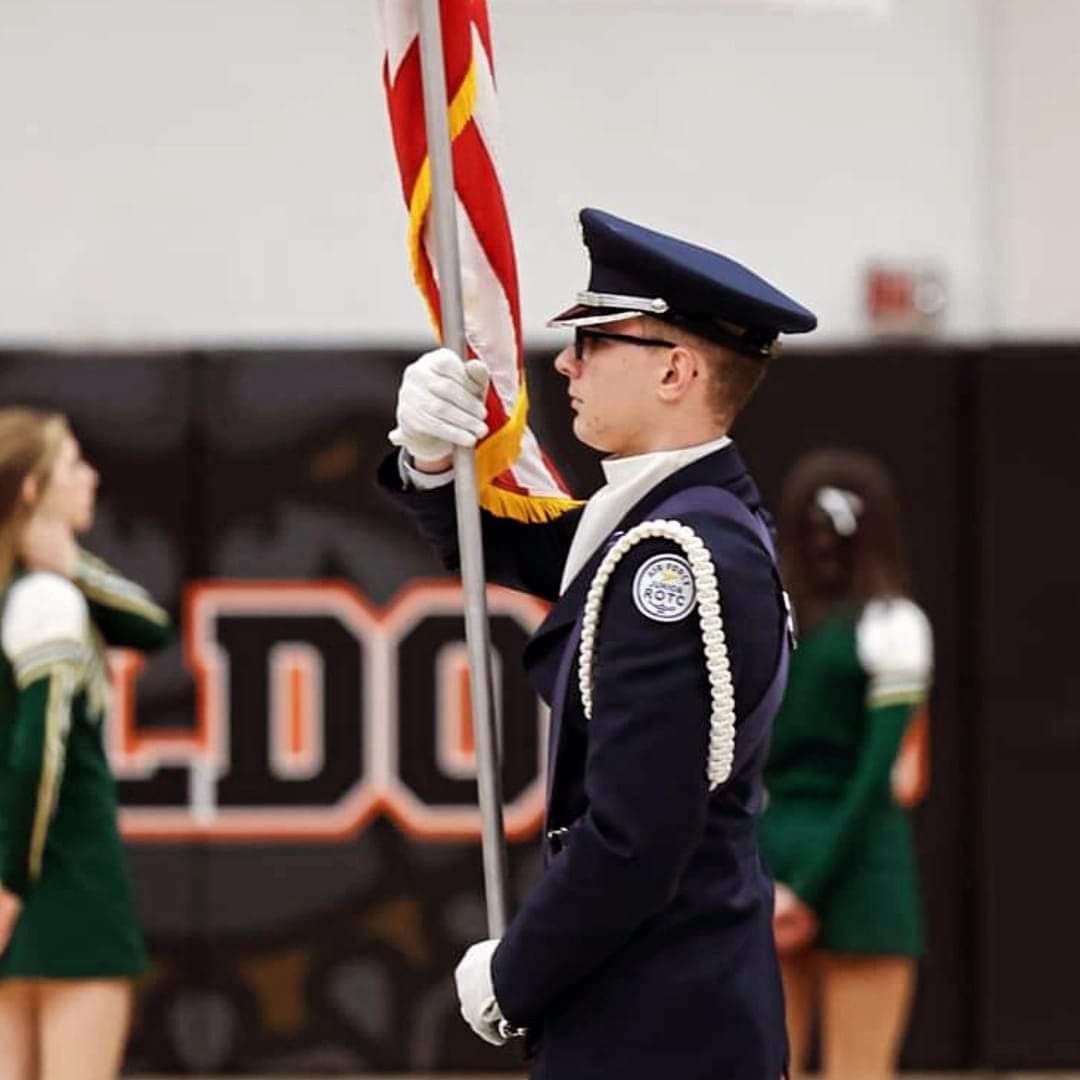 Senior Kevin Wright performs his drill at Green High School during the GlenOak vs. Green basketball game.