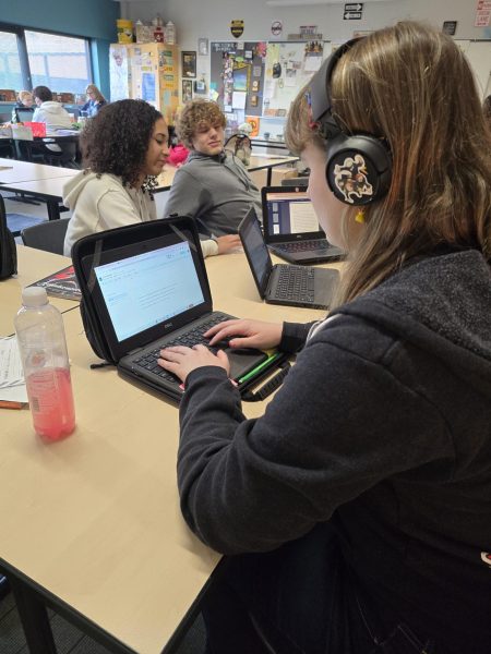 Senior Morgan Terakedis works on her online CCP comp class.  Comp class was moved online for semester only.  