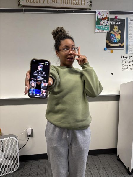 Senior JeKhia Ballard shows her TikTok profile. Ballard did not delete her TikTok app.