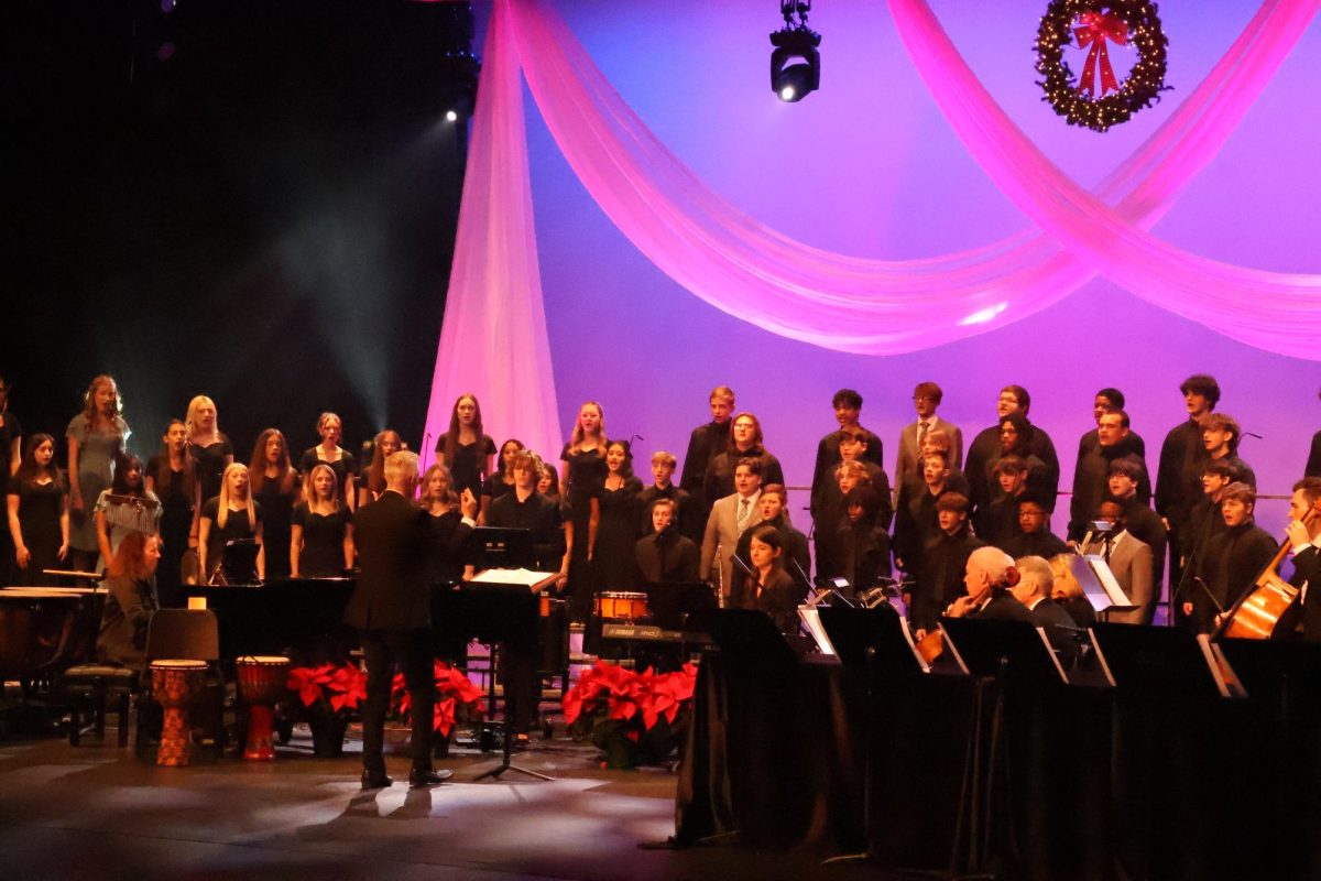 Diane Fedorka accompanies the GlenOak Choir at the Holiday Concert in December of 2025.