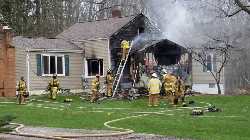 The firefighters on the scene of the Teter house fire.