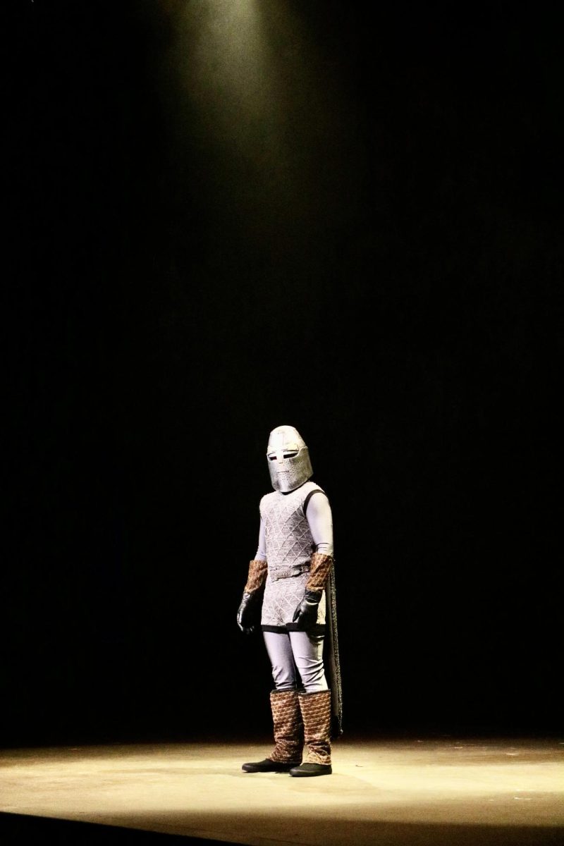 Junior Gus Kruger plays as one of Lord Farquad's knights.