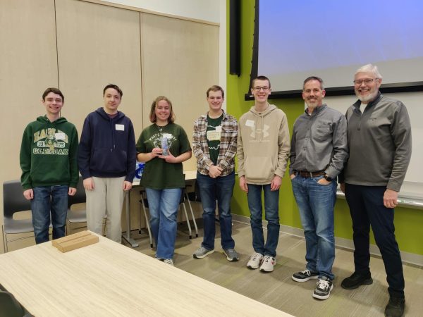 Mu Alpha Theta members Vincent Tilini, Ben Martens, Elizabeth Sowa, Ricky Talbott and Drew Nieporte pose with their award in April. 