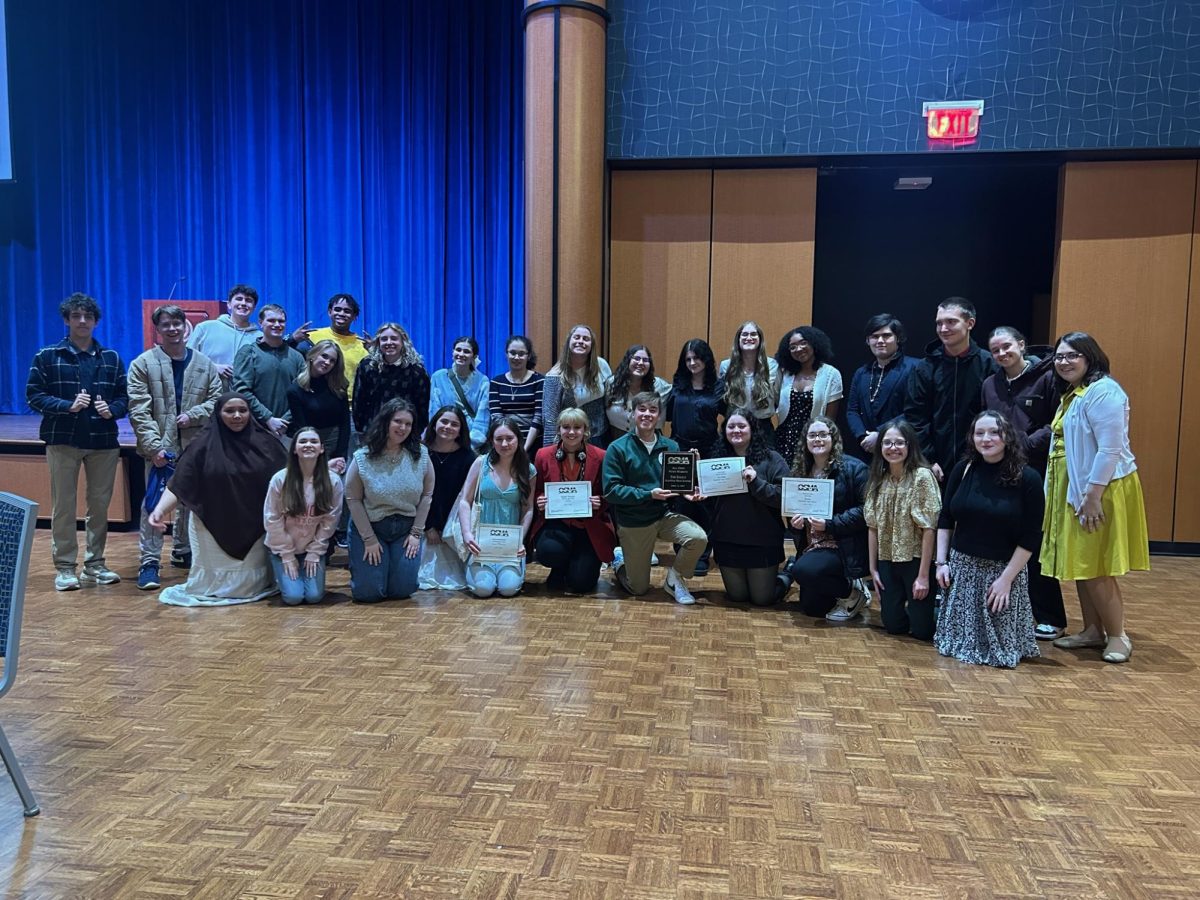Members of the news staff celebrate their award in April.