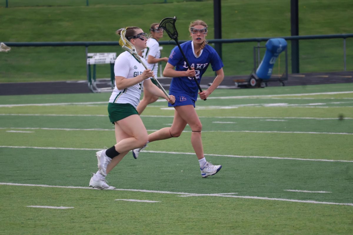 Sophomore Anna Senften during a lacrosse game in April.  Senften enjoys playing lacrosse the team bonding activities the team participates in. 