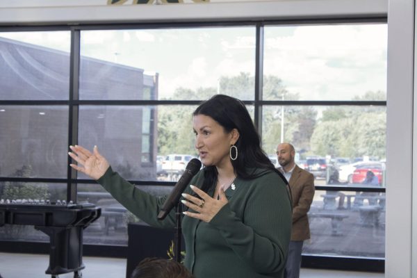 Mary Beddell, Director of Public Relations for Plain Local Schools, introduces the first group discussion prompt during the Futures Conference on Sept. 3.