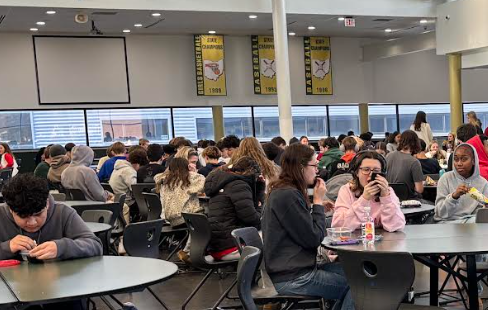 Students having lunch in the main commons. 