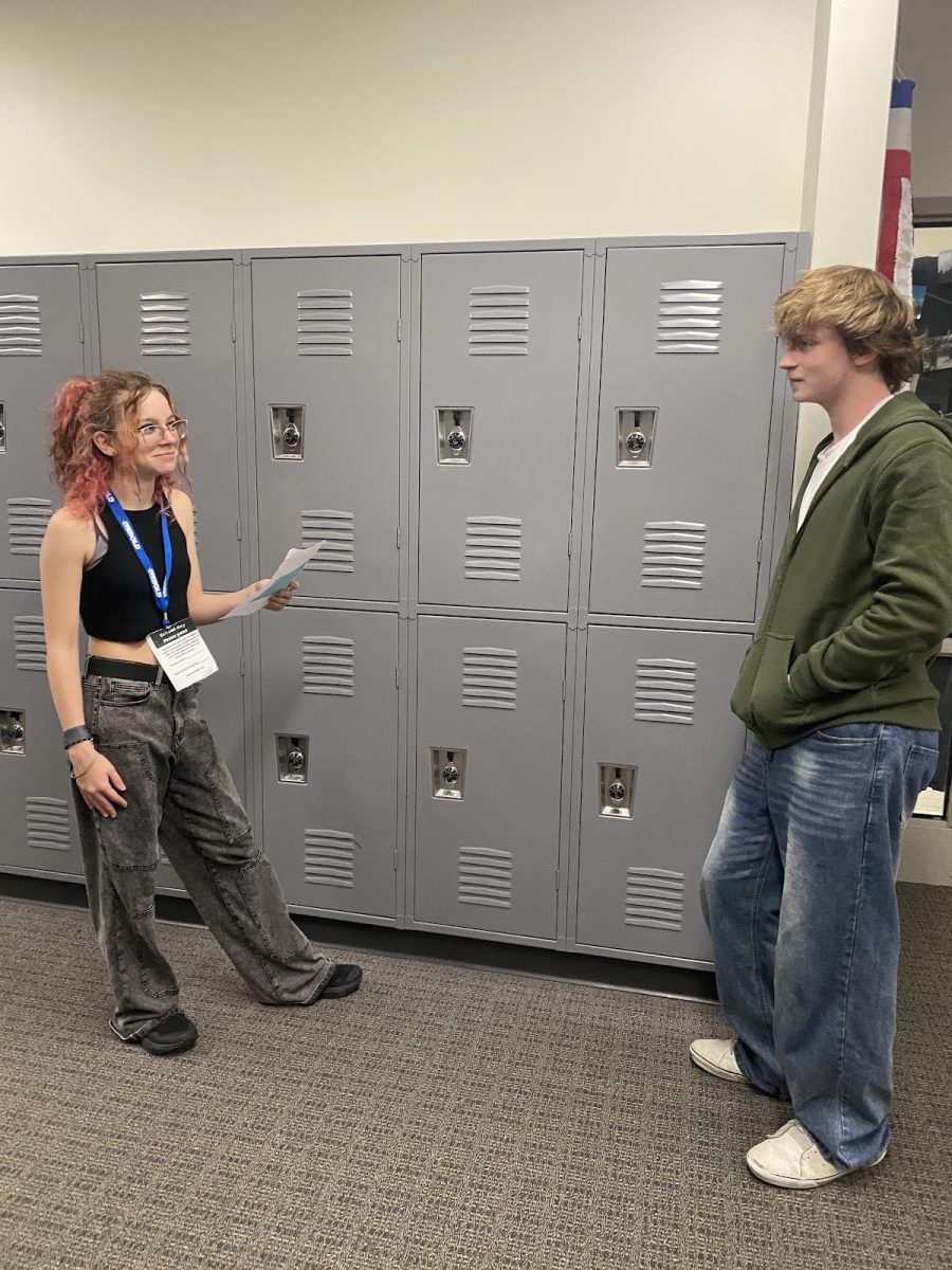 Logan Alexander is talking to Bowie Rouse about how he feels about his dad in the military