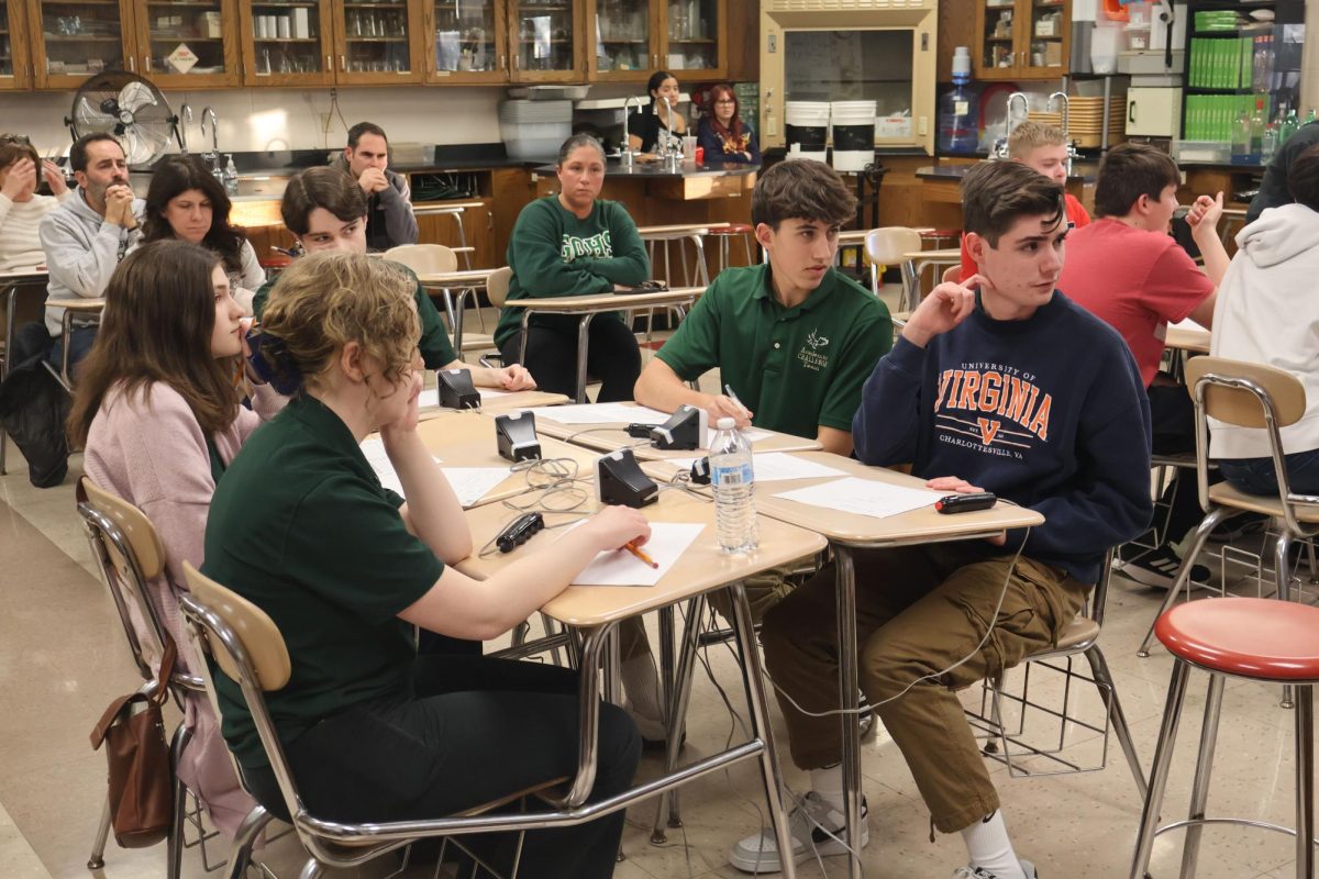 Halle Speelman, Liana Orn, Vincent Tilenni, Carter Uhren, and Jimmy Zurbuch compete in an academic challenge match in February. 