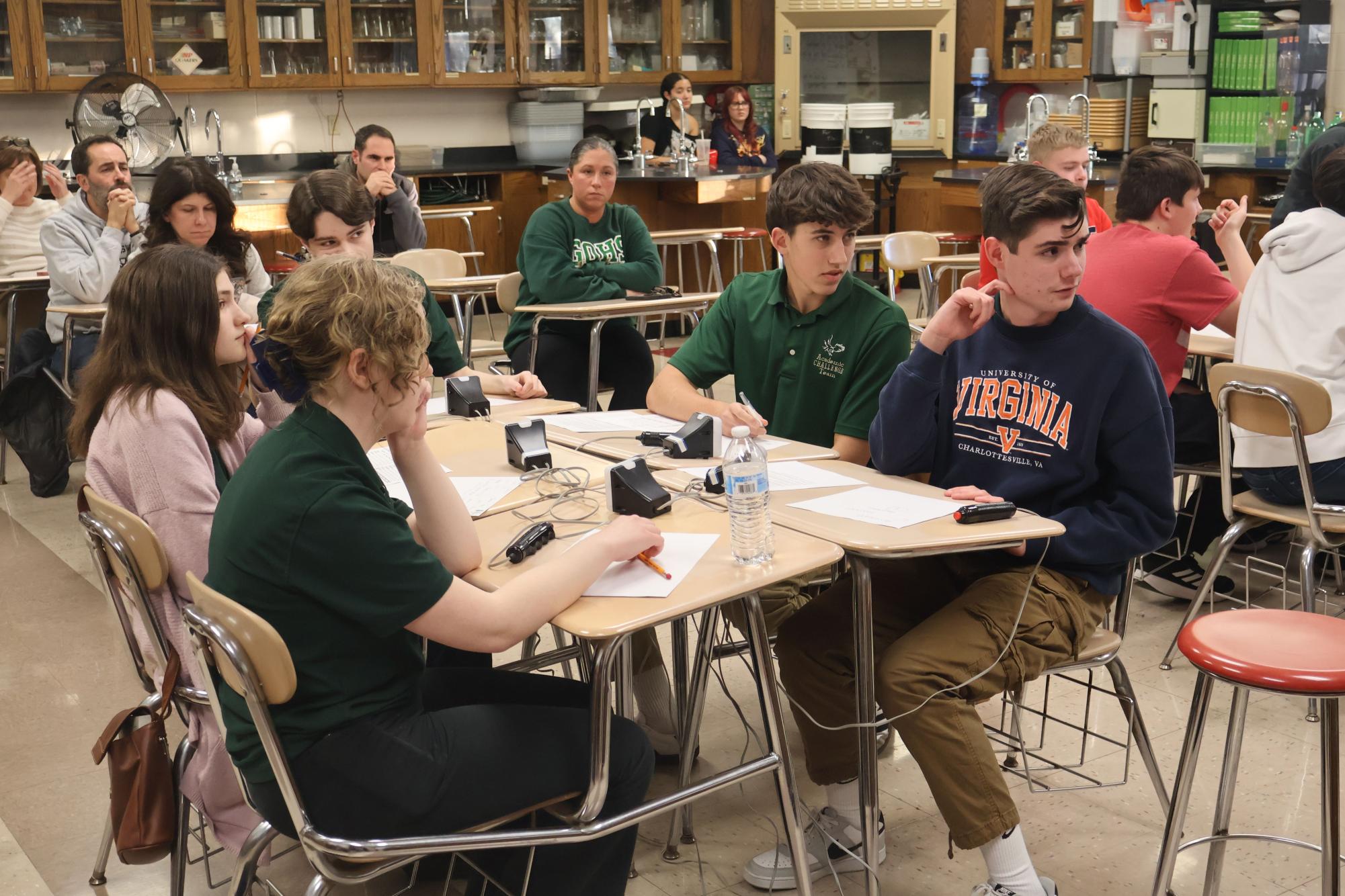 Halle Speelman, Liana Orn, Vincent Tilenni, Carter Uhren, and Jimmy Zurbuch compete in an academic challenge match in February. 