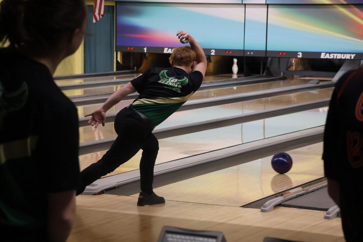 Junior Braxton Burns bowls during a match this season.  