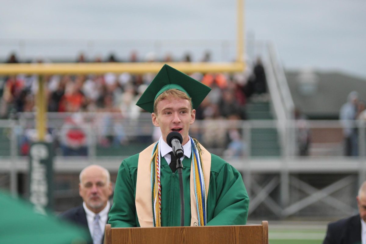 GlenOak graduate Zach Dyrlund speaks during last year's graduation ceremony.  This year the district has changed how speakers are chosen. 