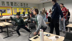 Juniors Ian Sonogan and Manny Estes participate in a game during their morning FCA meeting.