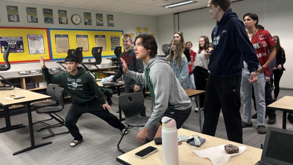 Juniors Ian Sonogan and Manny Estes participate in a game during their morning FCA meeting. 