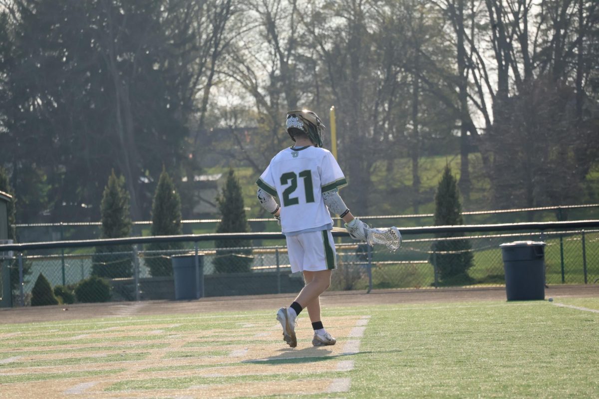 Junior Landon Phillips playing on the field