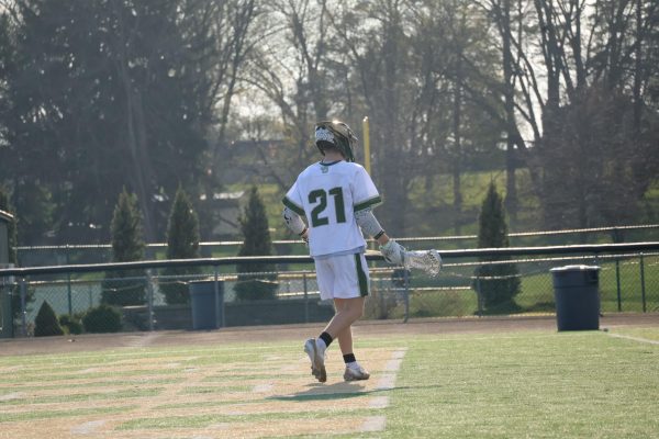 Junior Landon Phillips playing on the field